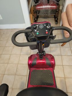 Red Electric Mobility Scooter