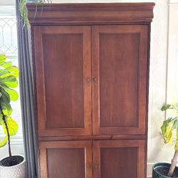 Free   65 Inch TV, Large Cherry Cabinet, Eliptical Work Out Equipment 