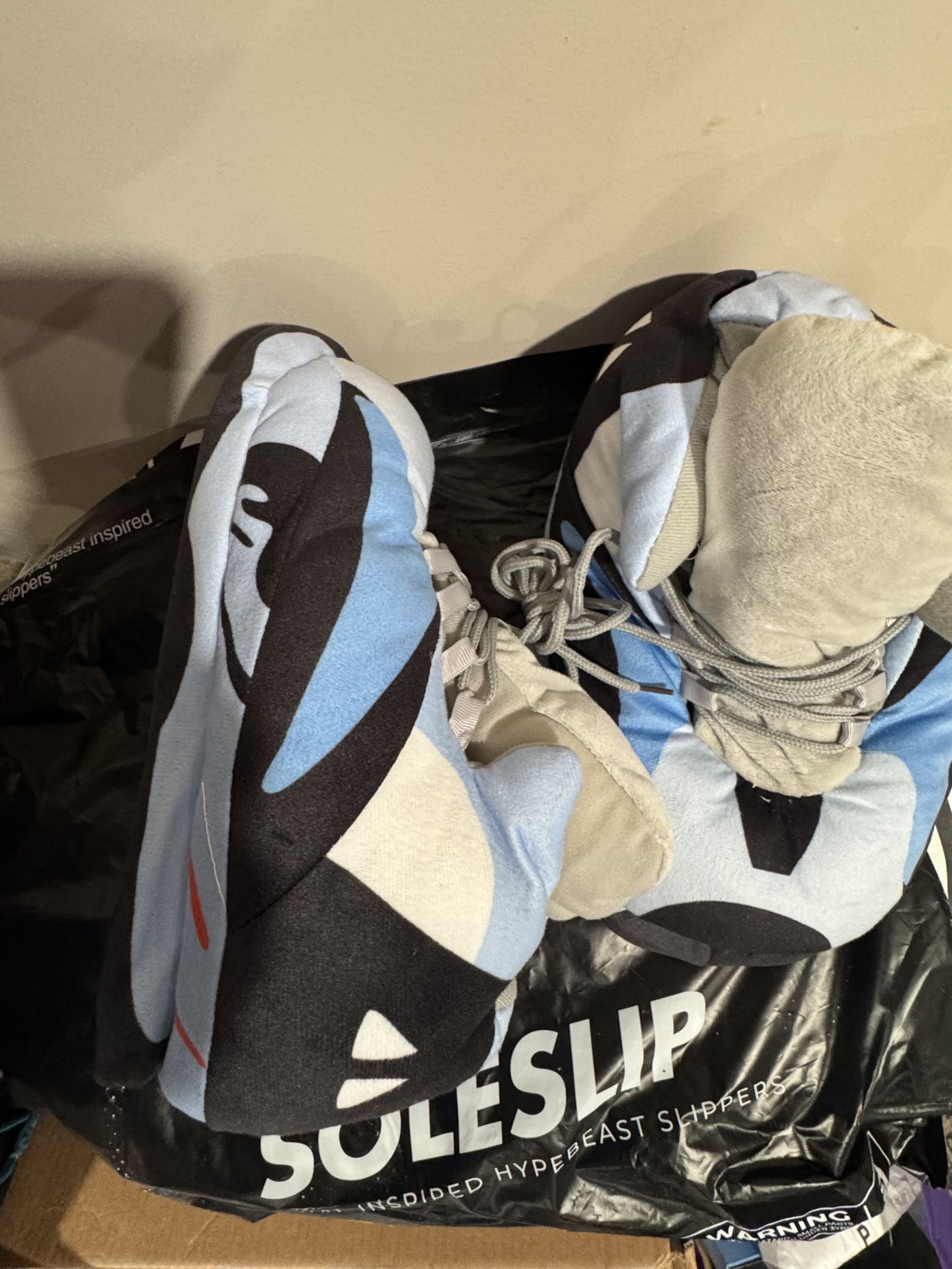 These are novelty Air Jordan 6-inspired slippers.