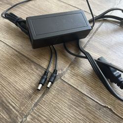 AC/DC power adapter. This type of adapter converts alternating current (AC)