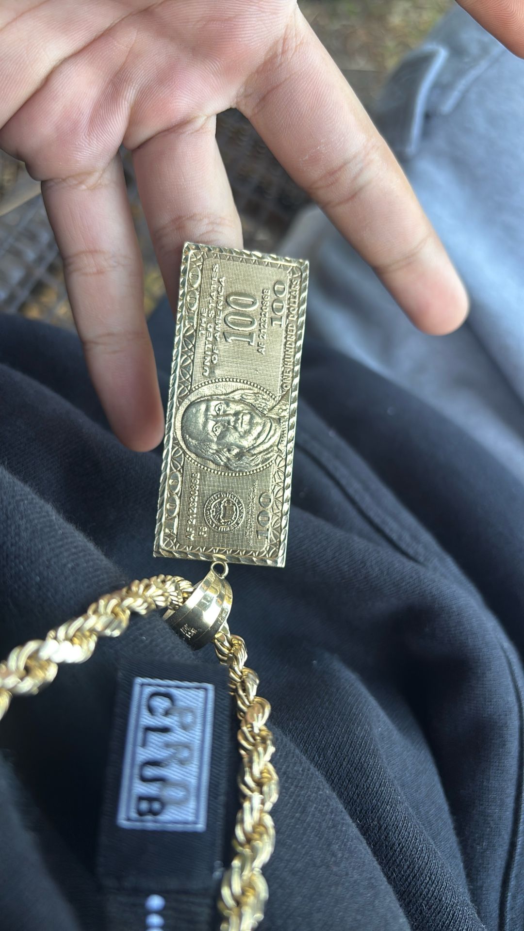 10k 100 dollar pendant