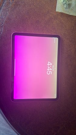 iPad (A16) pink with pink case and keyboard , ballpoint pen