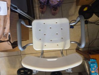 SHOWER SEAT. USED TWICE!