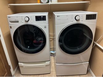 LG Front Load Washer & Dryer Set with Pedestals — Purchased New in 2021