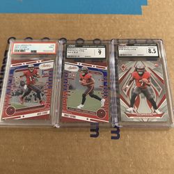 3 Buccaneers Cards Of Mike Evans And Two Of Bucky Irving