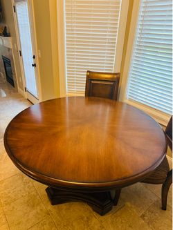 Solid wood 7 piece dining table by Ashley Furniture