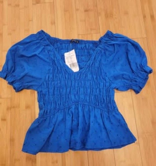 Brand new womens shirt size Large . Stretch material