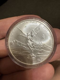 libertad 1oz on a Troy 1oz 1/2 on a libertad