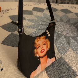 Stylish mini shoulder bag with a unique magazine-print design ✨ Lightweight, eye-catching, and perfect for everyday outfits or special looks. Clean, i