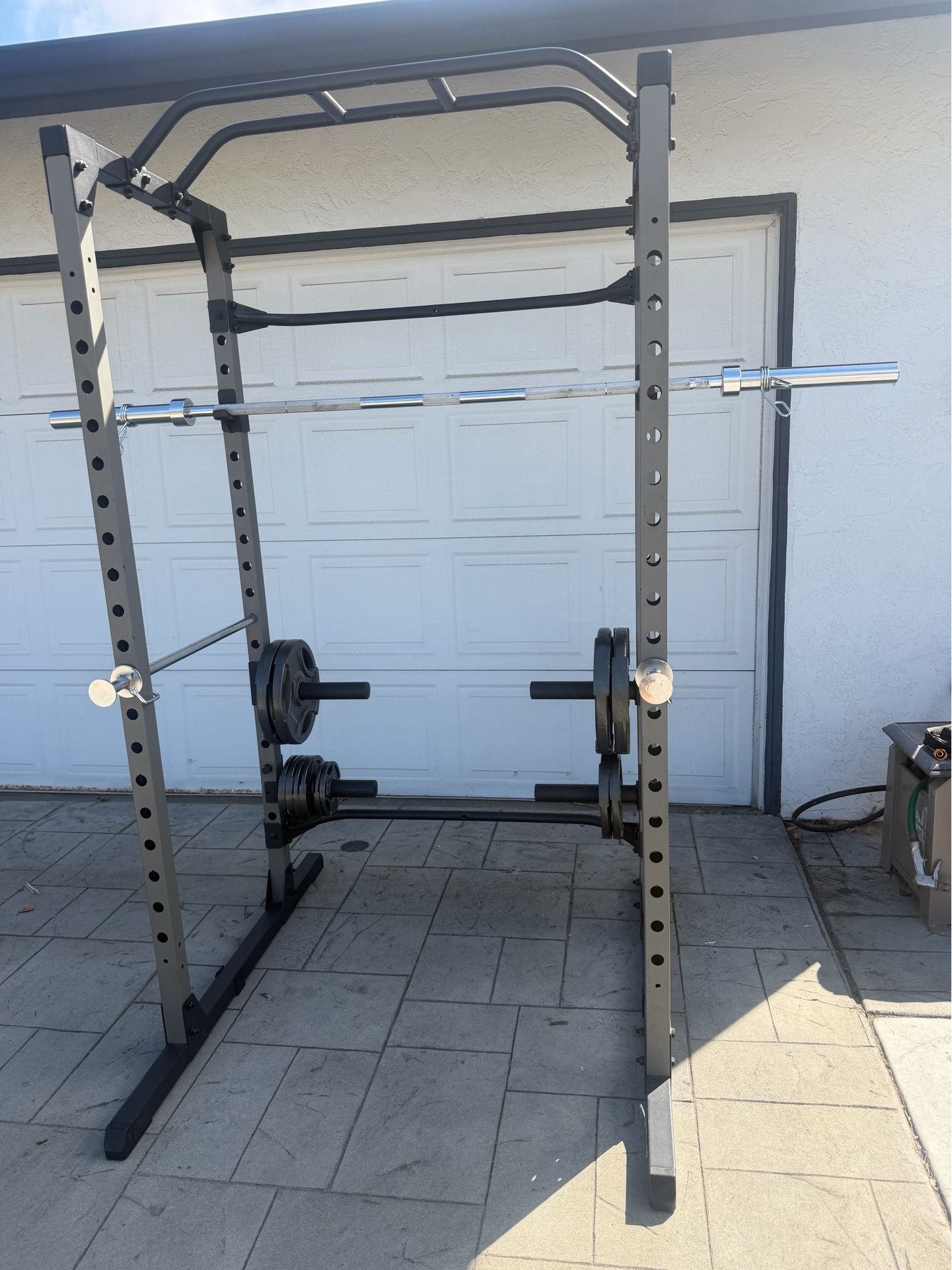 Squat rack + bench and Olympic weights - like new condition