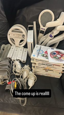 Wii+all cables+4 controllers+ a lot of accessories