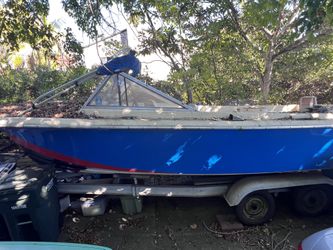 Boat, With Broken Motor And Trailer