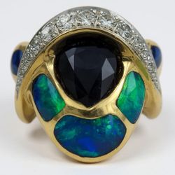 18k Yellow Gold Diamond Tanzanite and Opal ring.