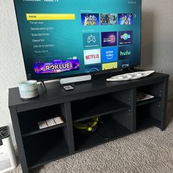 TV Hisense 43”  and TV stand 