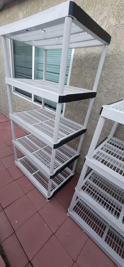 White sturdy storage shelves