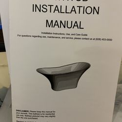 Free Standing White Tub And Faucet