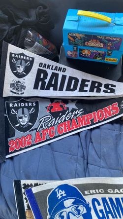 1998 & 2002 Raiders banner’s highly collected