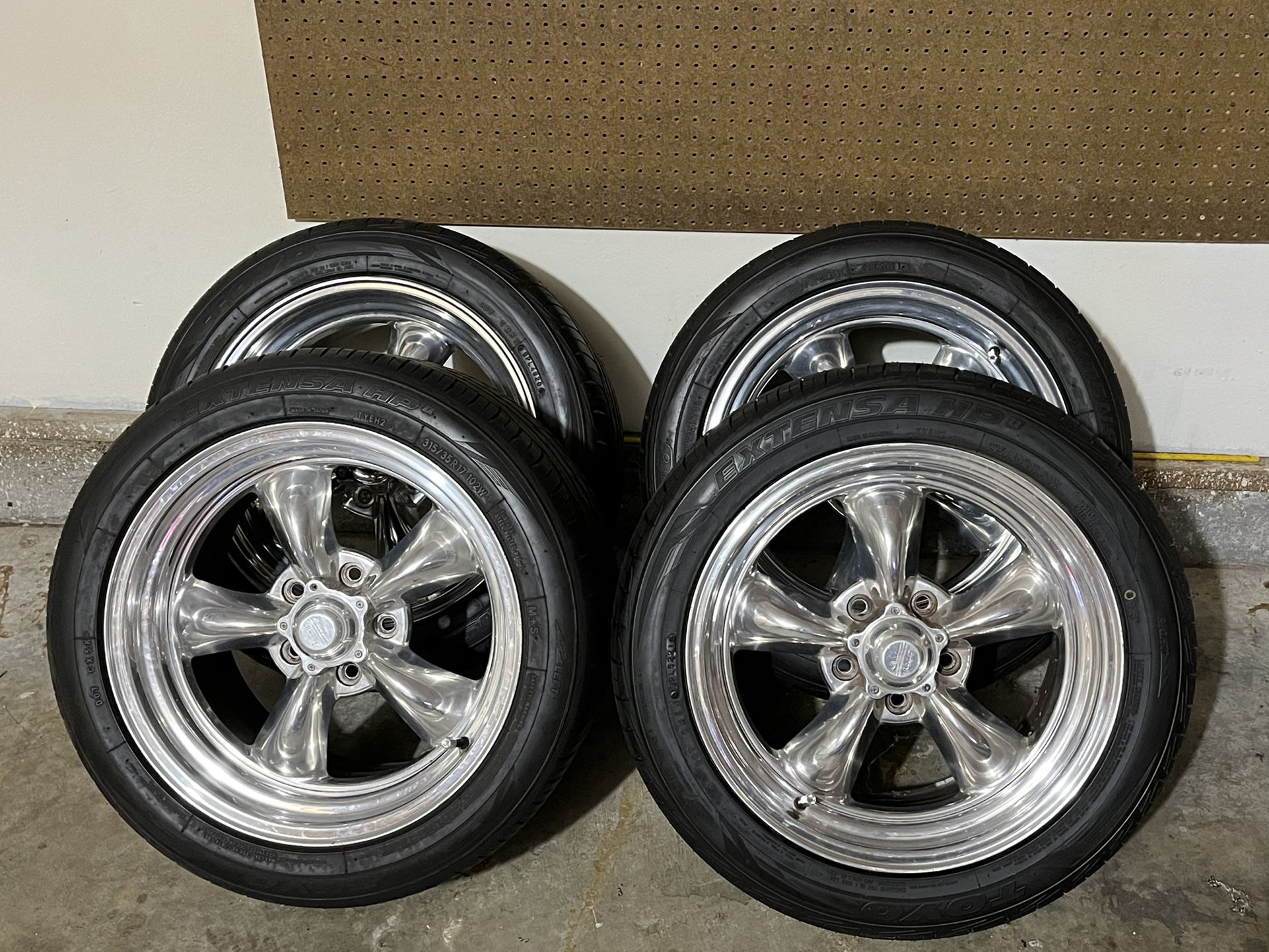 17x9.5/11 American Racing Torque Thrust Wheels