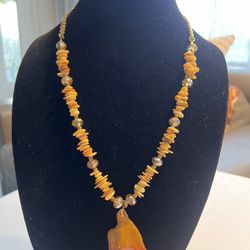 Mother of Pearl Shell Chips & Amber Colored Glass Beads & Polished Amber Colored Stone. 24” Long