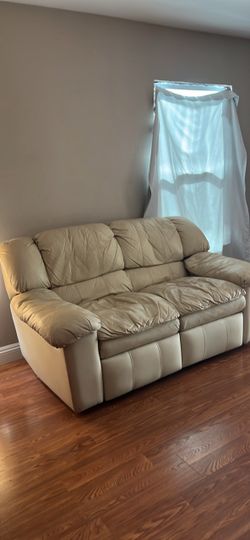 Cream / Beige Leather Dual Reclining Loveseat (Padded Arm & Bustle-Back Style)