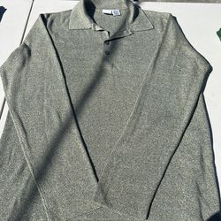 A/X Armani Exchange men's knitted polo sweater featuring a spread collar, long sleeves, and a button-up