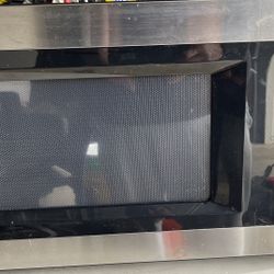 G E Stainless Steel Microwave Clean $150