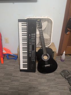 Keyboard and acoustic guitar bundle
