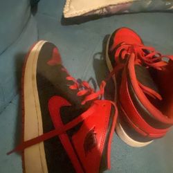 Black and Red high top jordan 1’s