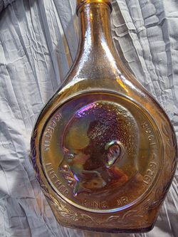 This item is a vintage Martin Luther King Jr. commemorative bottle produced by the Wheaton Glass Company, often found in their "Great American Series"