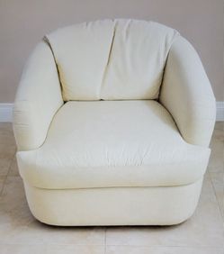 Yellow-cream swivel club chair