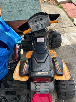 Kids motorized battery operated four wheeler