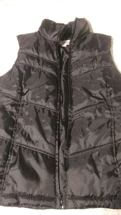 Black puffer vest (size small)