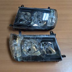 98-05 Toyota Land Cruiser FJ100 Black Headlights