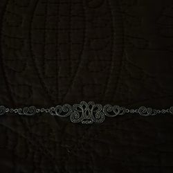 sterling silver filigree bracelet, likely crafted in a vintage or antique style.