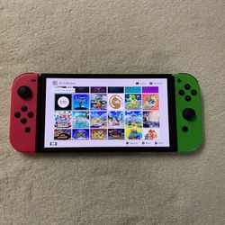 NINTENDO SWITCH OLED MOD with 100 SWITCH GAMES INCLUDED