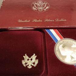 Two Highly Collectable Silver Dollars