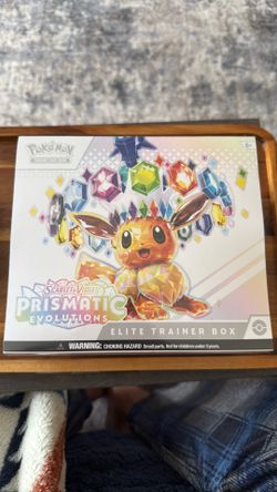 Prismatic evolutions elite trader box