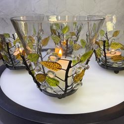 (1) Beautiful blown glass & metal artisan made tea light/votive candle holder. Four available.