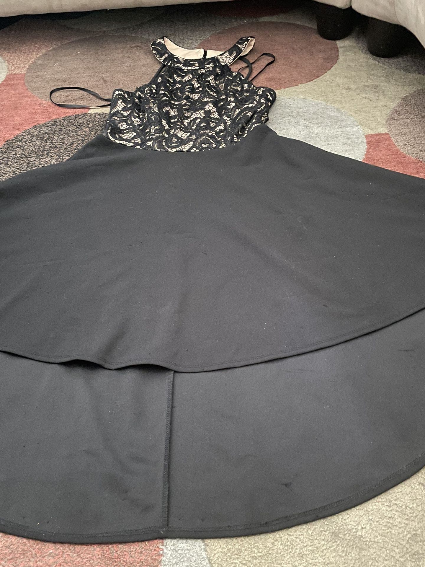 Black Dress With A Nude Background