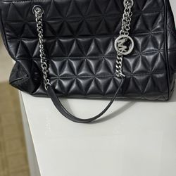 Black leather Michael Kors purse
