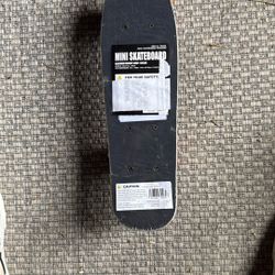 Mini Skateboard Still In Plastic