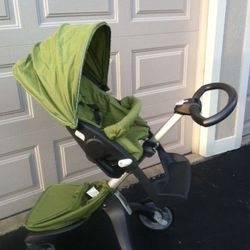 Stoke “Xplory” stroller(green), Carry cot and sleeping bag! 