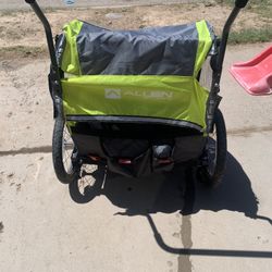 I Allen Sports Deluxe 2-Child Bicycle Trailer & Stroller, max capacity 100 lbs,