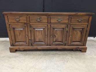 Rustic Dark Stained Wood Sideboard with Ornate Hardware