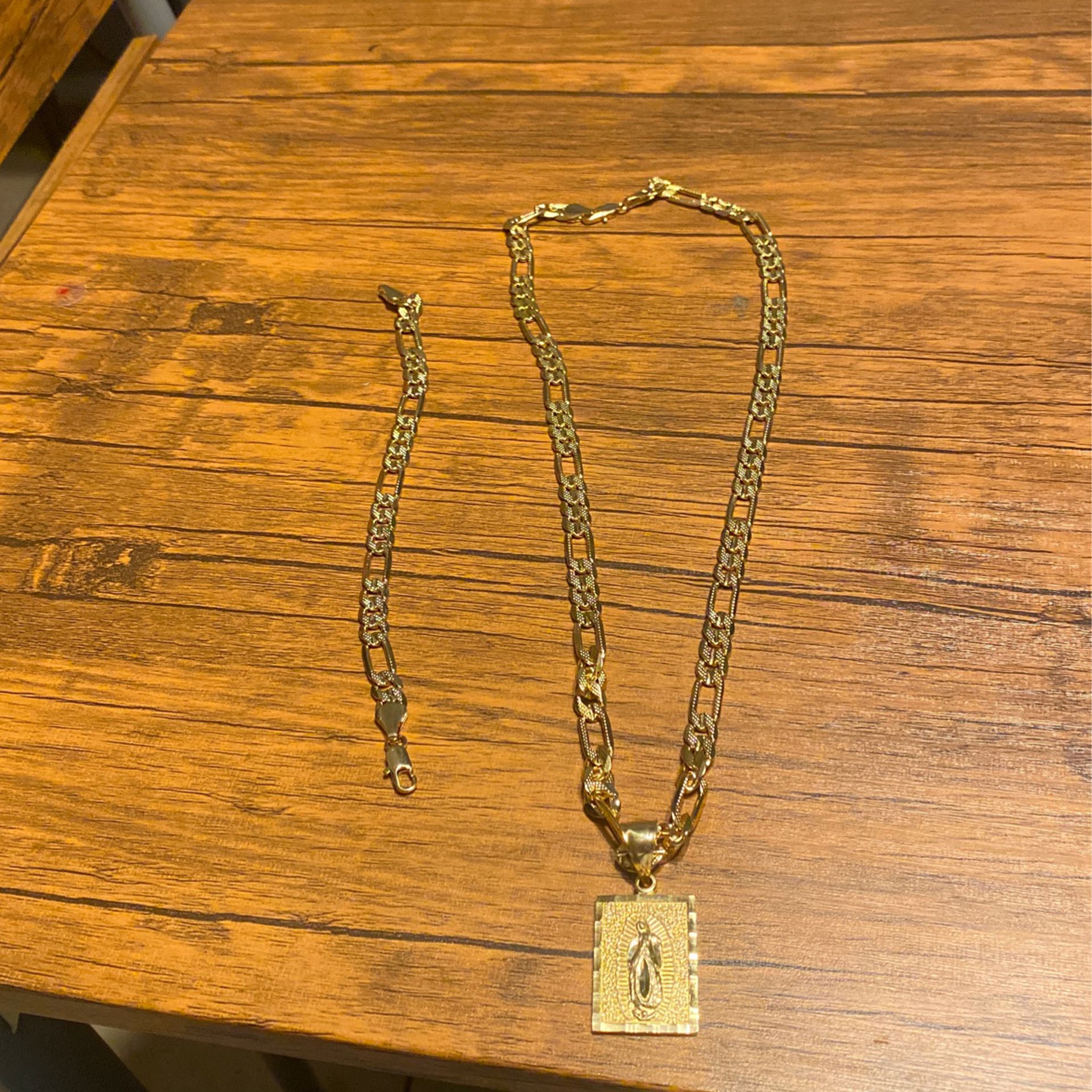 18k Chain With Pendant And 18k Bracelet