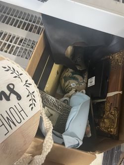 2 boxes of various random home decor 