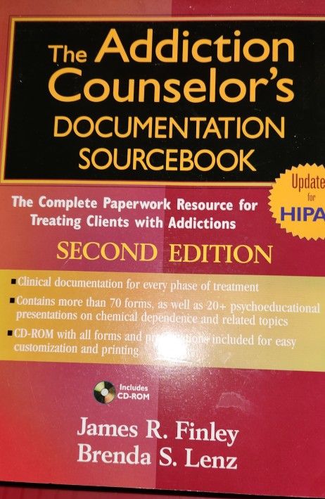 Counselor documenting book