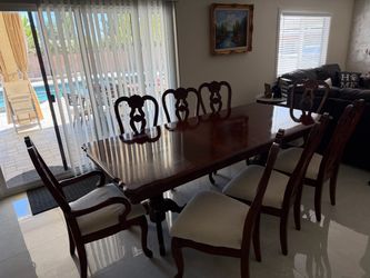 Dining table and chairs set