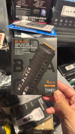 WD_Black SN850X 4TB NVMe SSD with Heatsink - M.2 2280, Up to 7,300 MB/s Read speeds, Up to 6,300 MB/s Write speeds, Gaming Expansion, High Performance