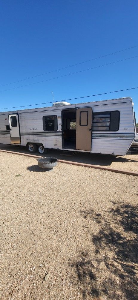 1990 Travel Trailer. 30 Ft. Storage Trailer